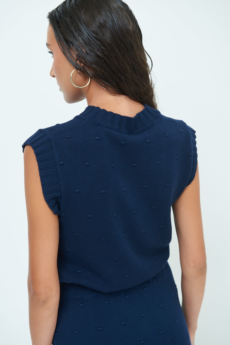 Sleeveless knit top with textured pattern wholesale