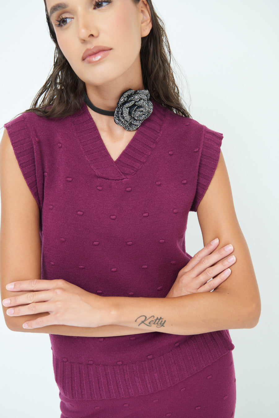 Sleeveless knit top with textured pattern wholesale