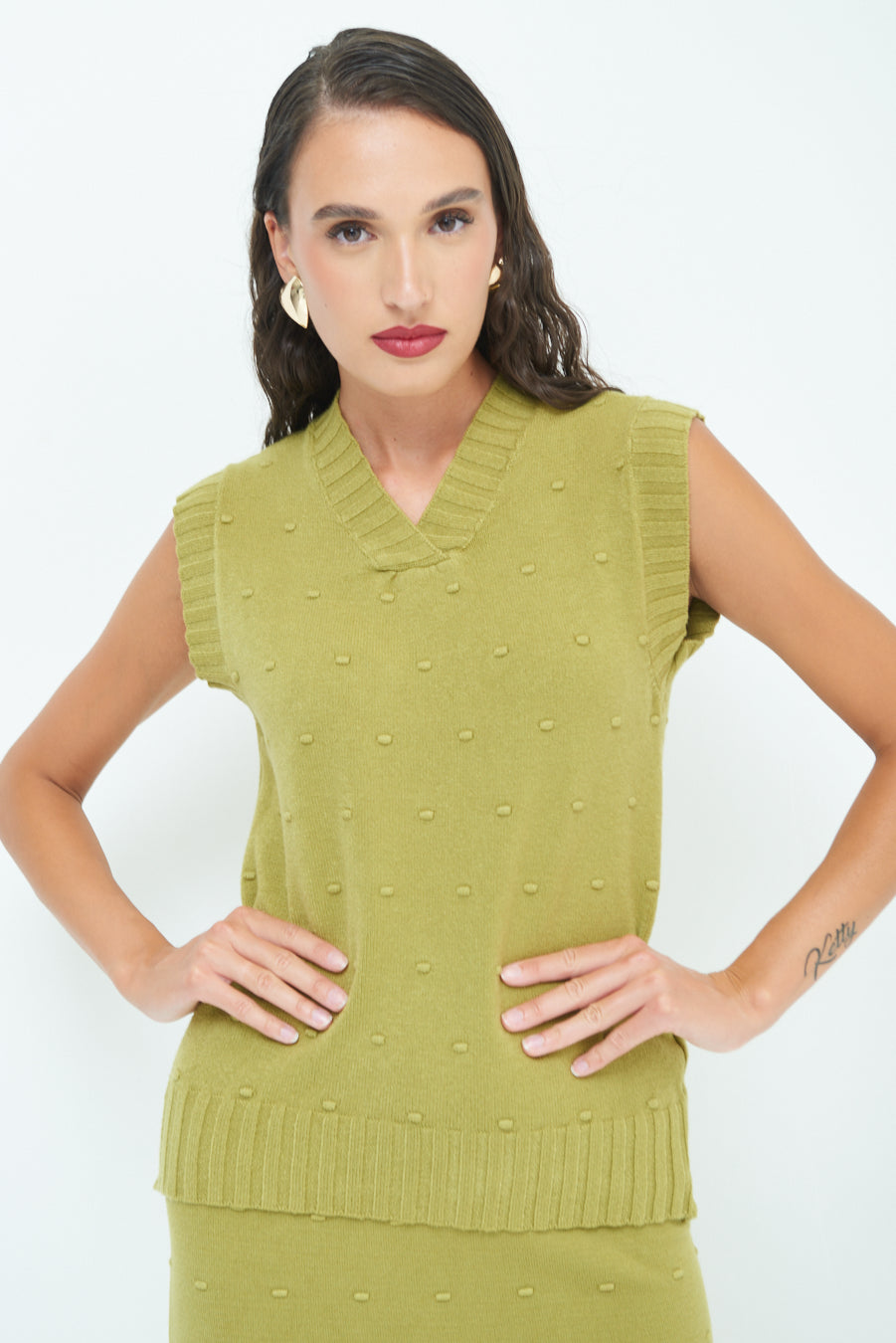 Sleeveless knit top with textured pattern wholesale