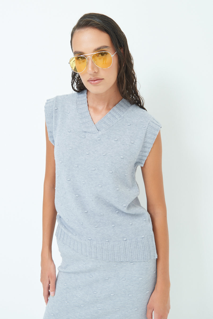Sleeveless knit top with textured pattern wholesale