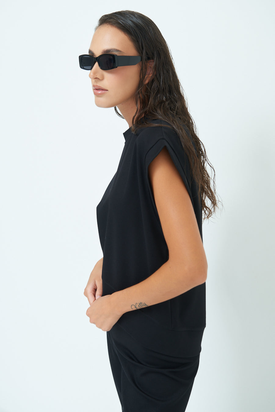 Sleeveless crew neck top with rolled sleeves wholesale