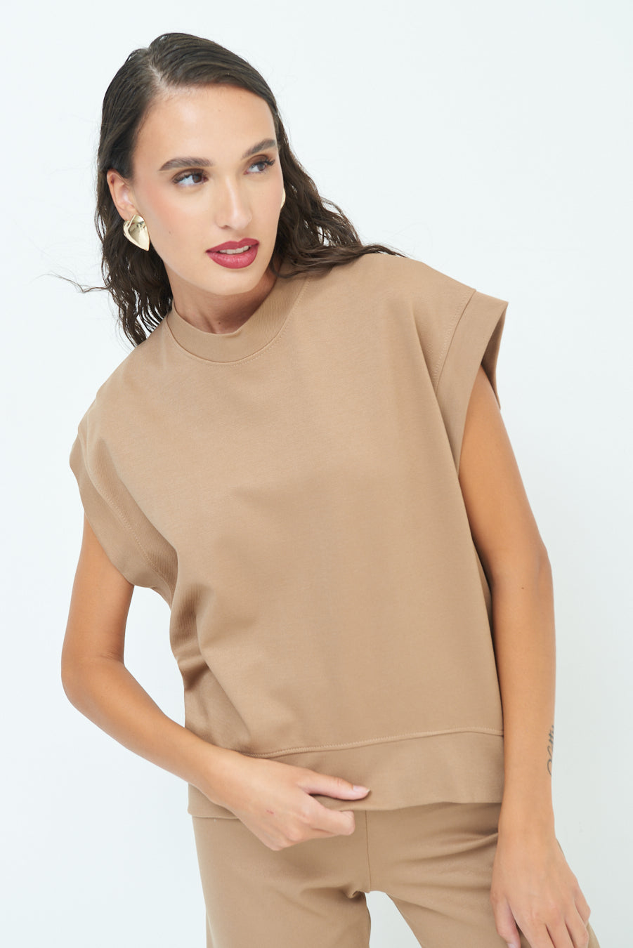Sleeveless crew neck top with rolled sleeves wholesale