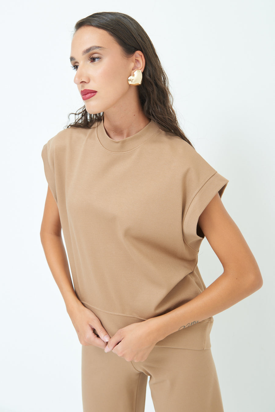 Sleeveless crew neck top with rolled sleeves wholesale