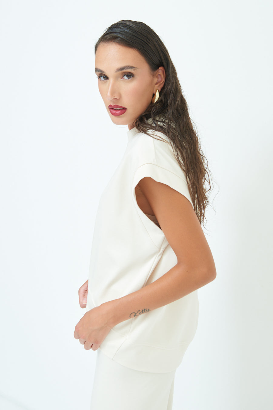 Sleeveless crew neck top with rolled sleeves wholesale
