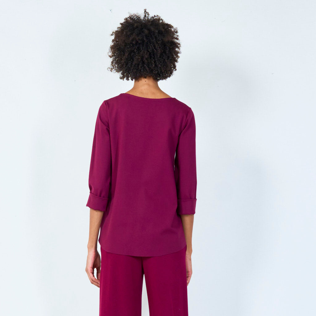Asymmetrical top with cuffed sleeves wholesale