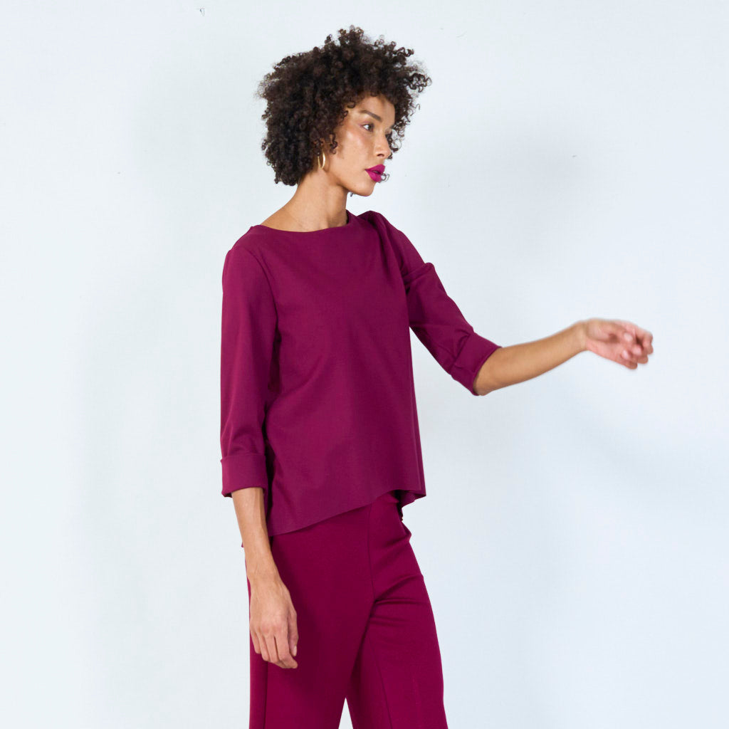 Asymmetrical top with cuffed sleeves wholesale
