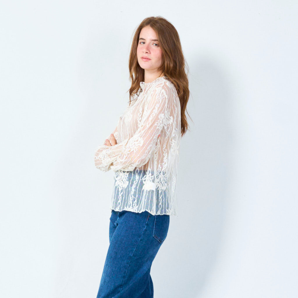 Vintage-inspired lace top with vertical floral patterns wholesale
