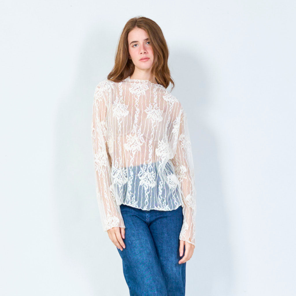 Vintage-inspired lace top with vertical floral patterns wholesale