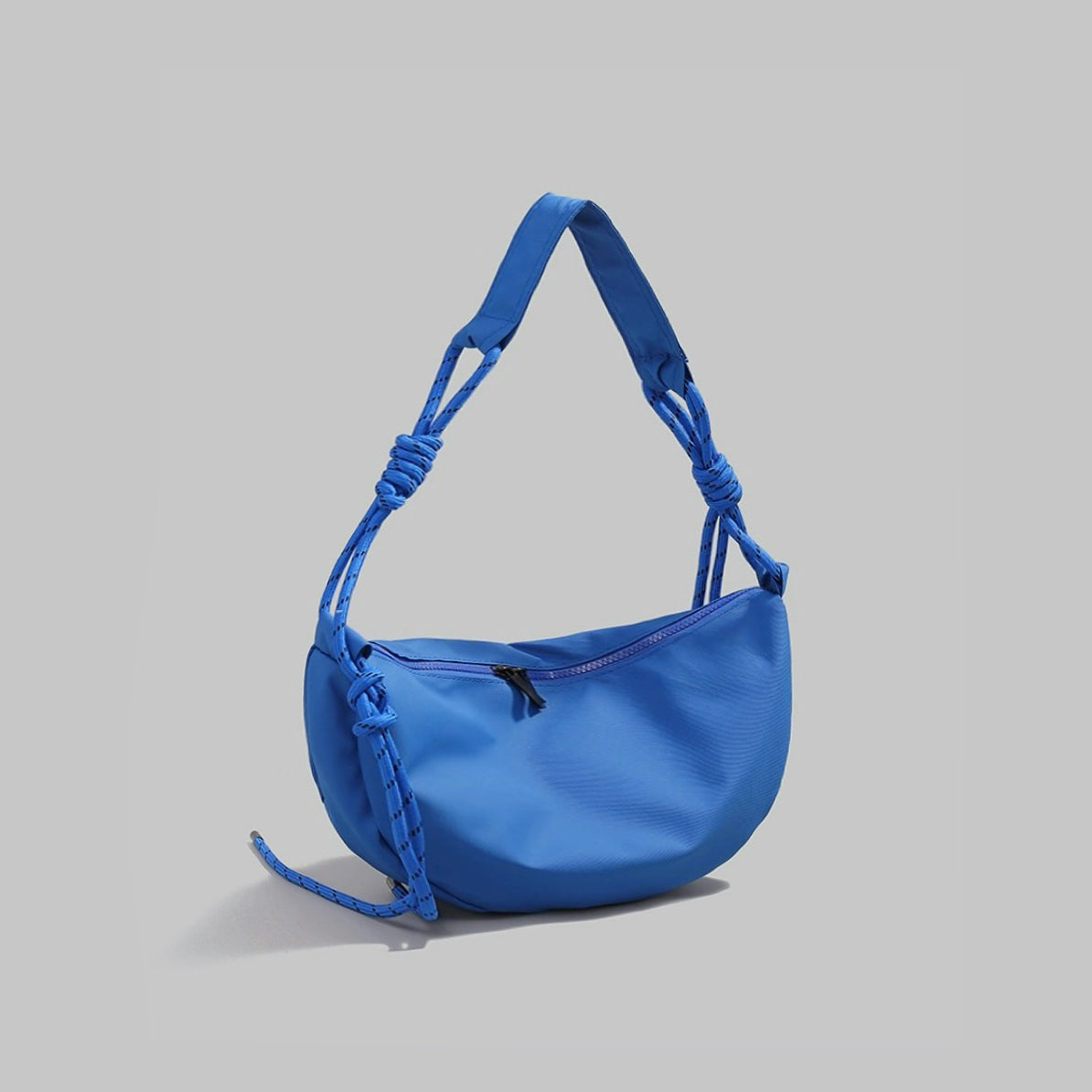 Casually Knotted Nylon Crescent Sling Bag