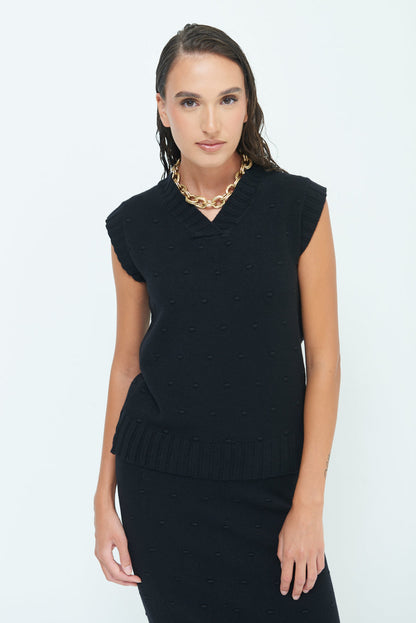 Sleeveless knit top with textured pattern wholesale