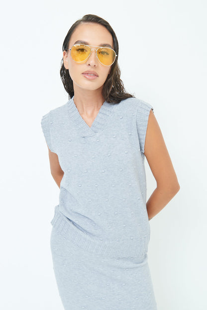 Sleeveless knit top with textured pattern wholesale