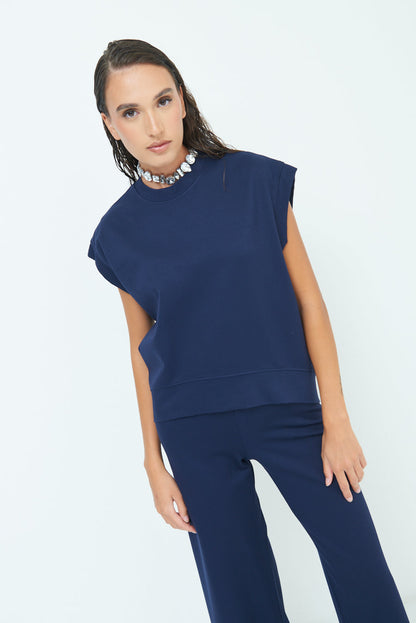 Sleeveless crew neck top with rolled sleeves wholesale