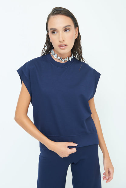 Sleeveless crew neck top with rolled sleeves wholesale