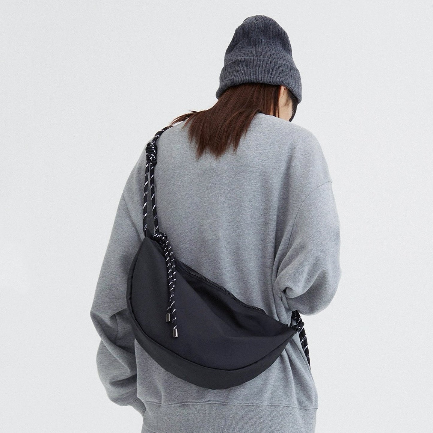 Casually Knotted Nylon Crescent Sling Bag