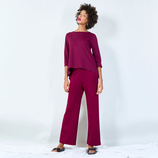 Asymmetrical top with cuffed sleeves wholesale