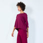 Asymmetrical top with cuffed sleeves wholesale